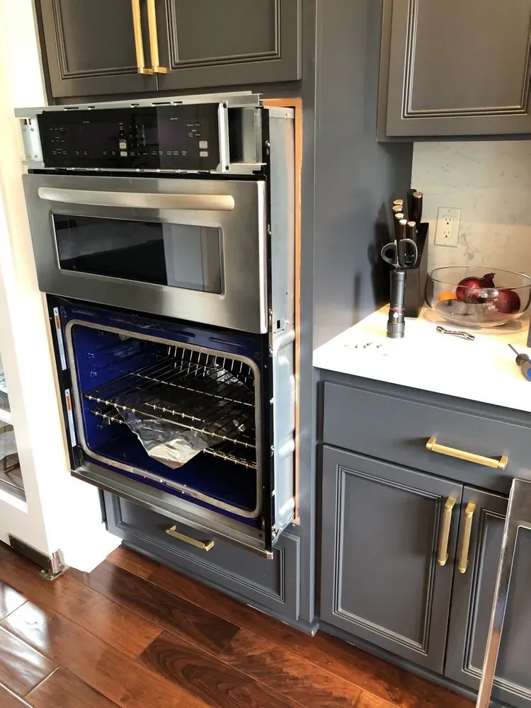 Oven pulled out from cabinet for repair — Spark Appliance Repair, Mountain View CA